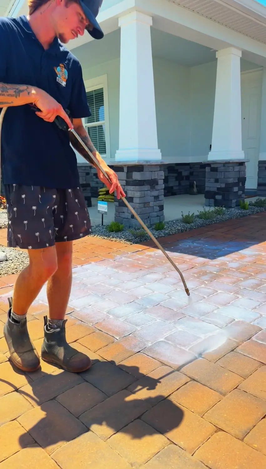 All Elite crew member preparing pavers at a local home